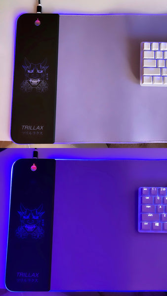 Two RGB mousepads stacked one on top of other demonstrating captivating light effects with one illuminated and the other in a deactivated state, showcasing the lavender light effects.