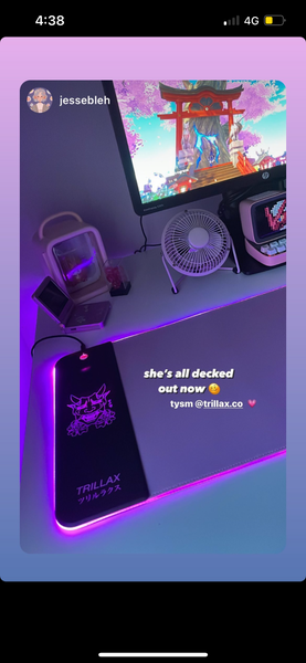 Review by Jessebleh: An image showcasing the Lavender RGB mousepad illuminating on her desktop, accompanied by the comment 'she's all decked out now,' expressing satisfaction with the stylish and vibrant setup.
